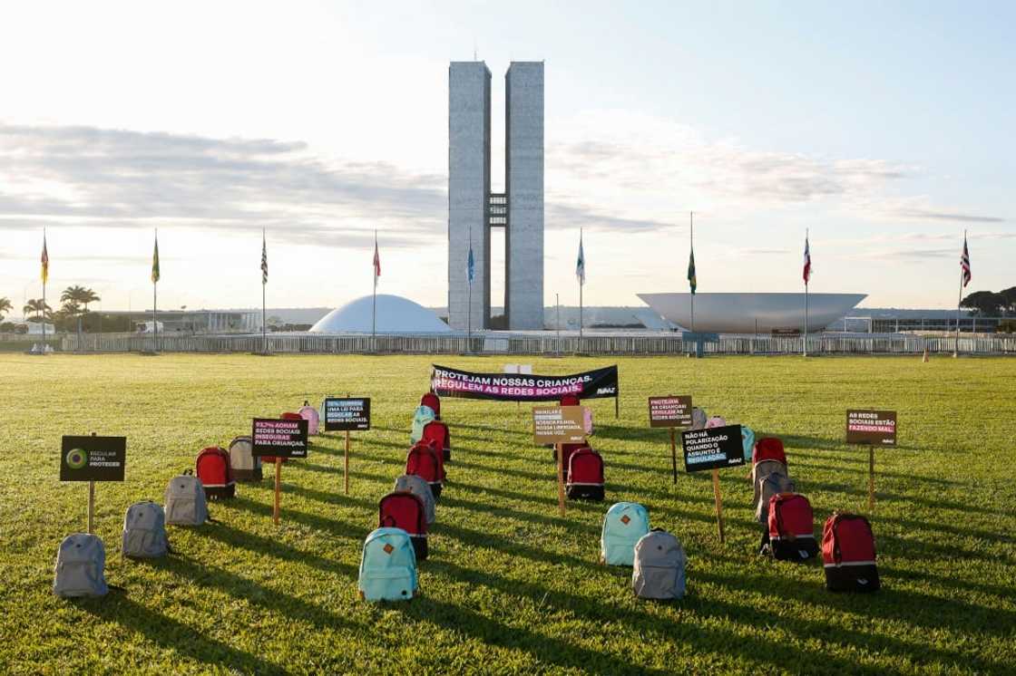 Backpacks representing victims of school massacres, which activists say have increased in Brazil amid lack of regulation of extremism social media, are seen during a protest in front of the National Congress in the capital Brasilia Backpacks representing victims of school massacres, which activists say have increased in Brazil amid lack of regulation of extremism social media, are seen during a protest in front of the National Congress in the capital Brasilia