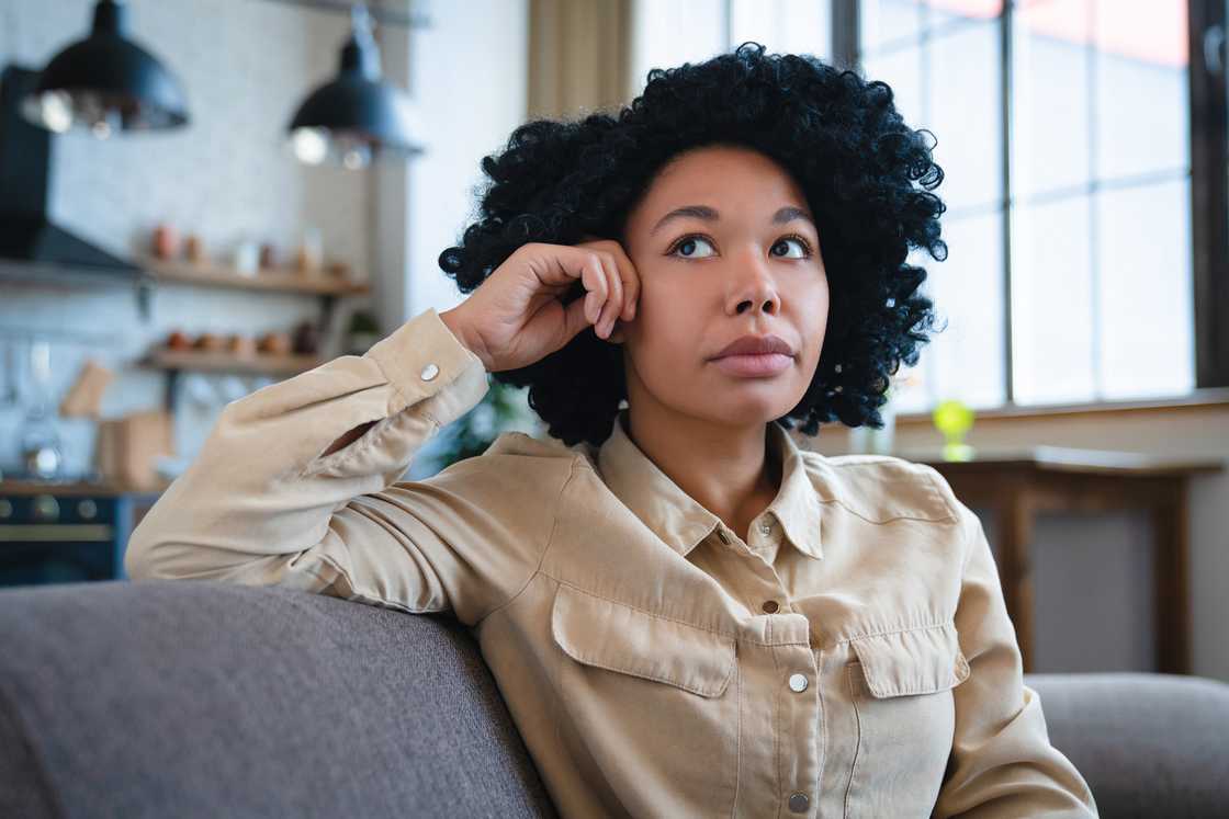 A woman thinking of relationships problems A woman thinking of relationships problems