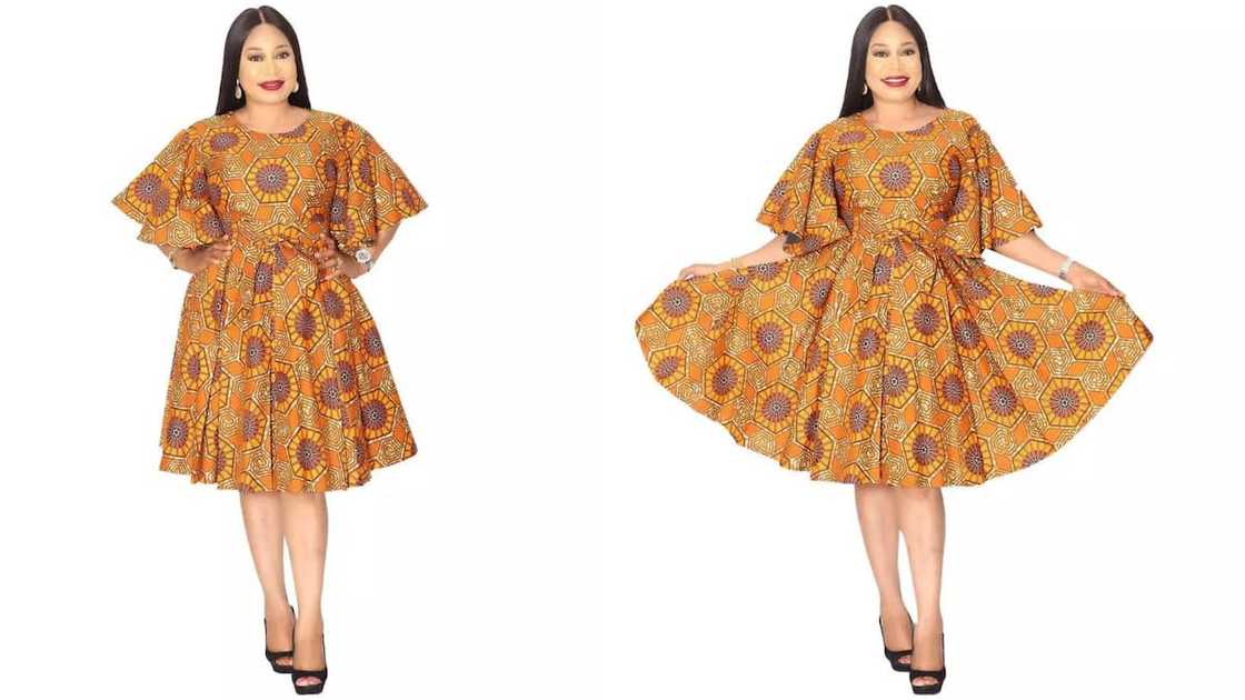 Knee-length dress with flared sleeves Knee-length dress with flared sleeves