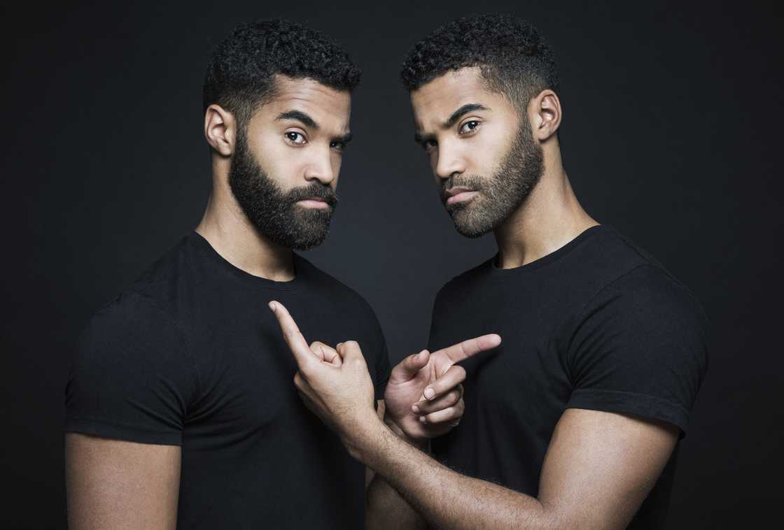 A stock photo of two male lookalikes A stock photo of two male lookalikes