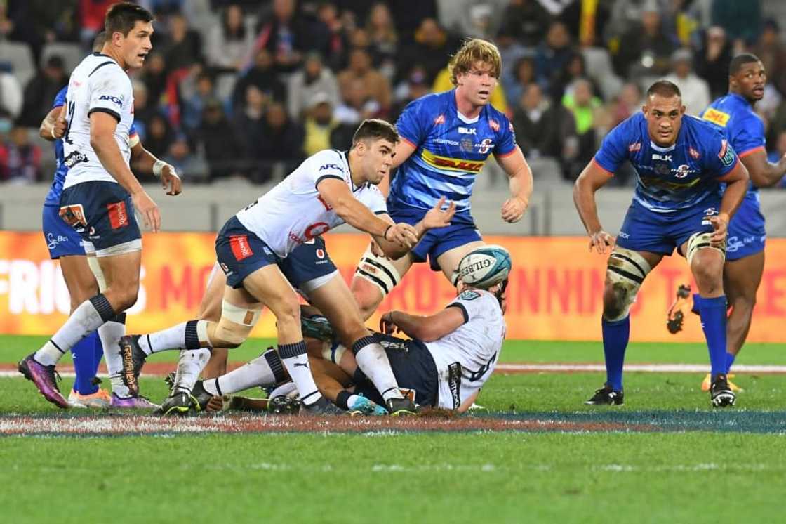 Bulls scrum-half Zak Burger (C) in action in the United Rugby Championship (URC) final rugby union match against the Stormers at Cape Town Stadium on June 18, 2022 Bulls scrum-half Zak Burger (C) in action in the United Rugby Championship (URC) final rugby union match against the Stormers at Cape Town Stadium on June 18, 2022