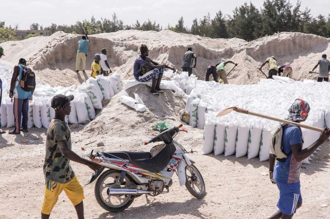 The water influx washed away thousands of tonnes of harvested salt The water influx washed away thousands of tonnes of harvested salt