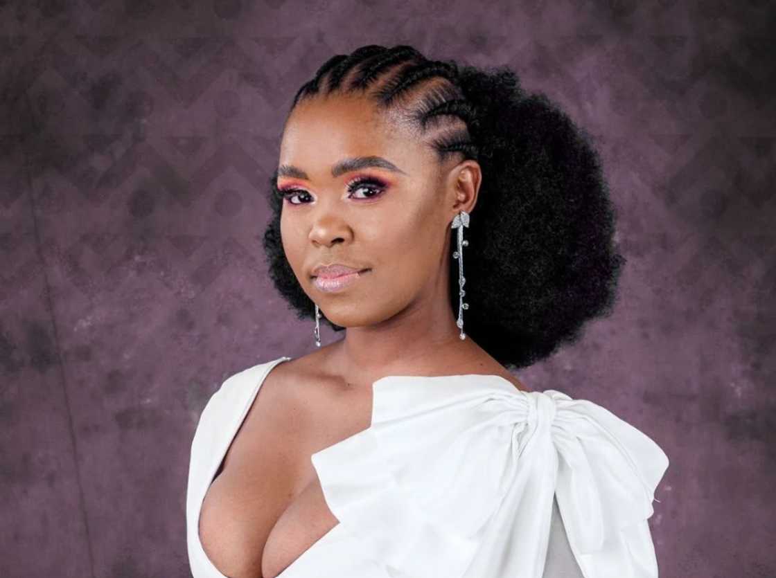 Zahara in a white dress