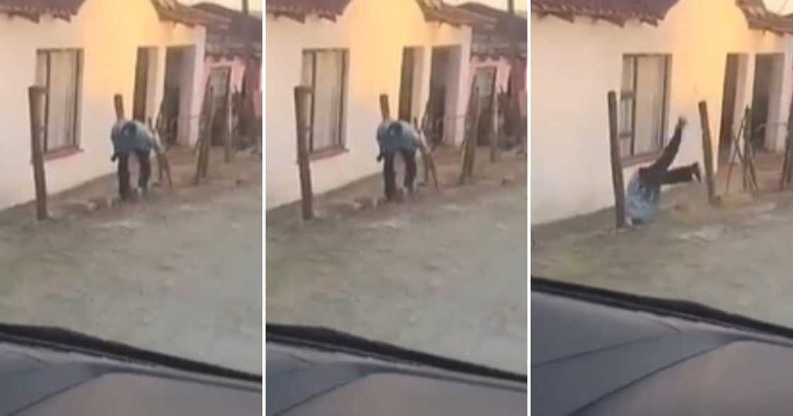 A man falling over a fence in a funny clip A man falling over a fence in a funny clip