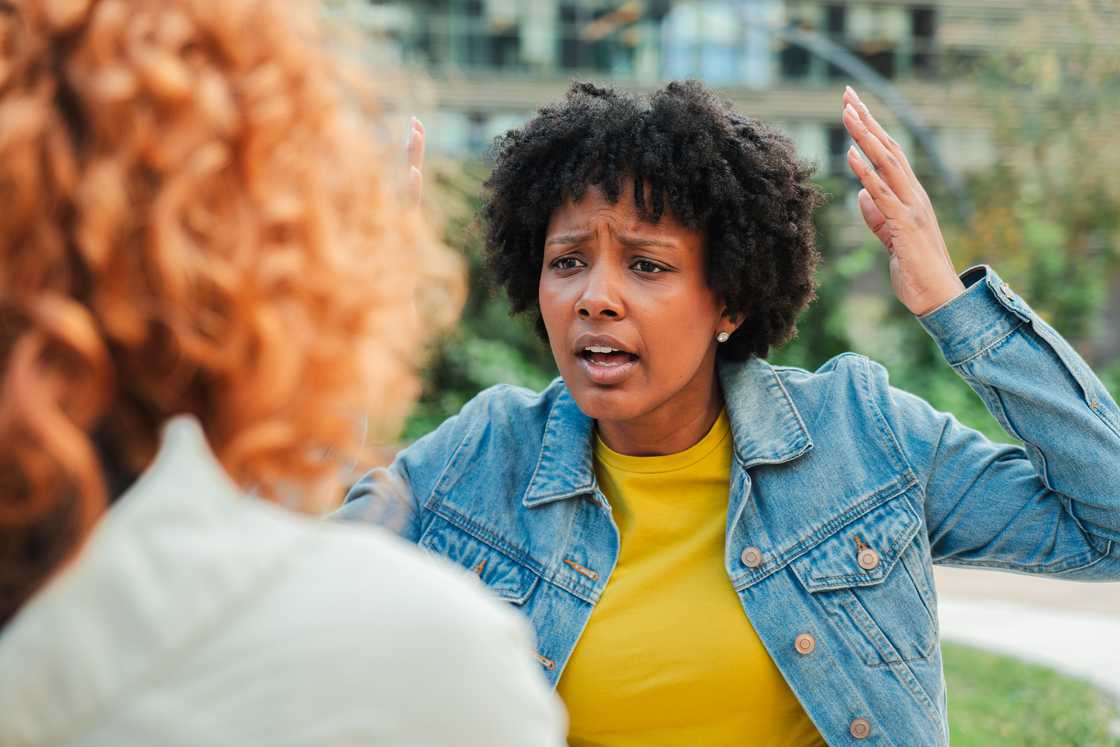 Two women arguing Two women arguing