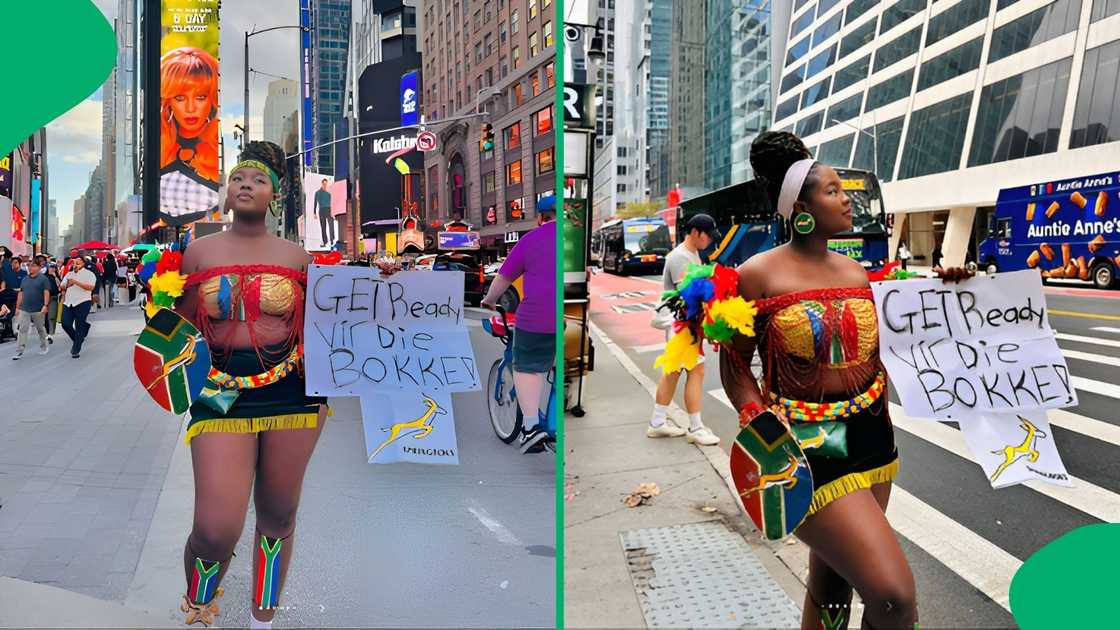 The woman walked around carrying placards hyping the Springboks The woman walked around carrying placards hyping the Springboks
