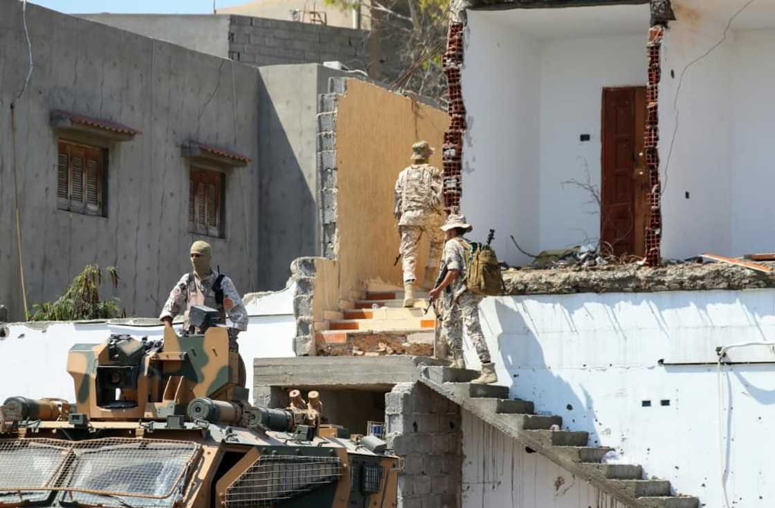 Members of 444 Brigade take up positions after fighting between two militias nominally loyal to Abdulhamid Dbeibah's Government of National Unity Members of 444 Brigade take up positions after fighting between two militias nominally loyal to Abdulhamid Dbeibah's Government of National Unity