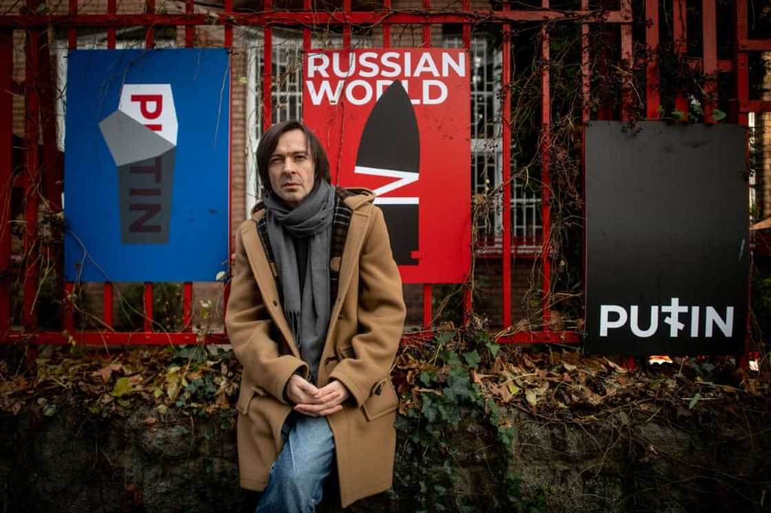 'I can be more useful doing what I am good at': Ukrainian graphic artist Mykola Kovalenko with some of his posters 'I can be more useful doing what I am good at': Ukrainian graphic artist Mykola Kovalenko with some of his posters