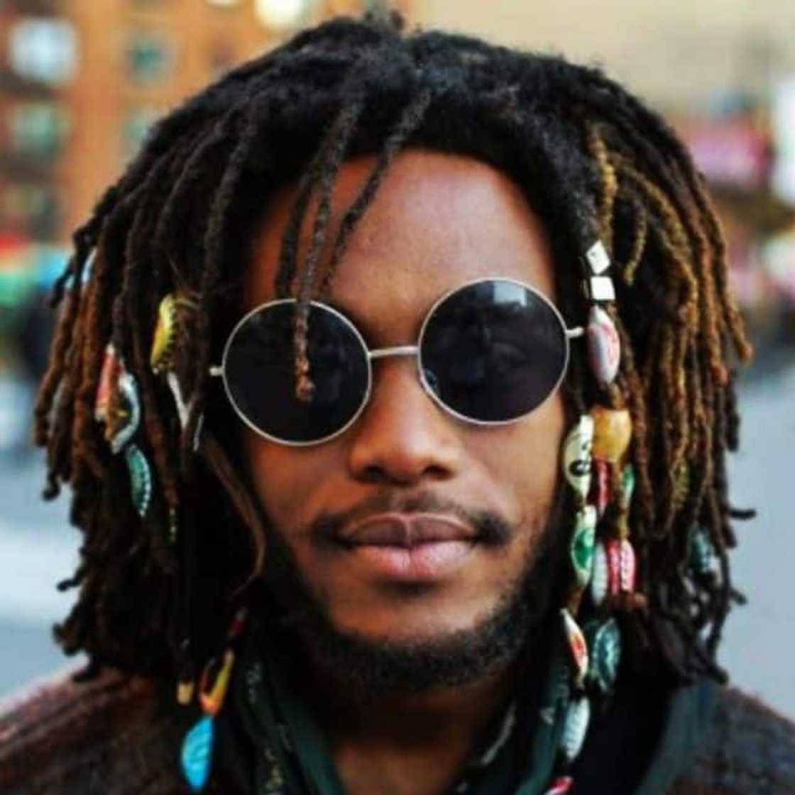 How do you style dreads for men?