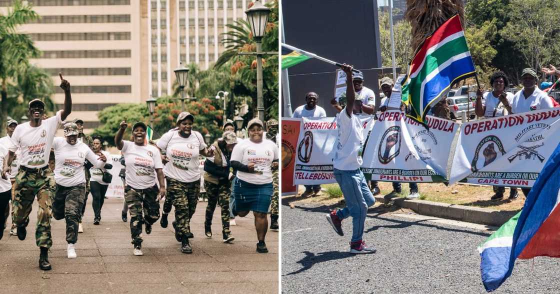 Members of Operation Dudula chant anti-migrant slogans as they march in central streets of Durban