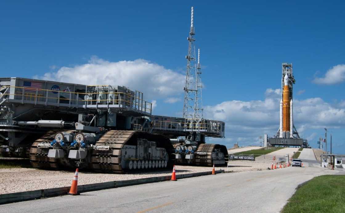 The Artemis 1 rocket will be ferried along on a giant rolling platform moving very slowly in order to avoid damaging the rocket with vibrations in transit