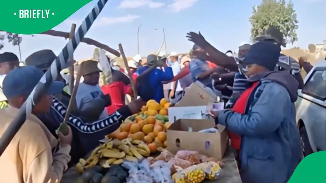 Street vendors continue to navigate the complex social dynamics of trading during national protest actions Street vendors continue to navigate the complex social dynamics of trading during national protest actions