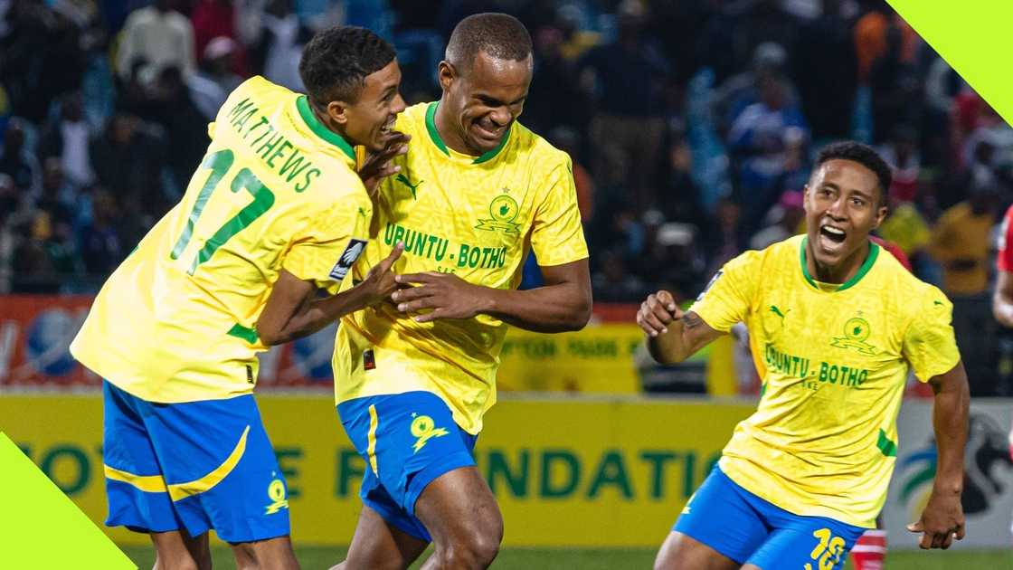 Mamelodi Sundowns' players celebrate scoring a goal.