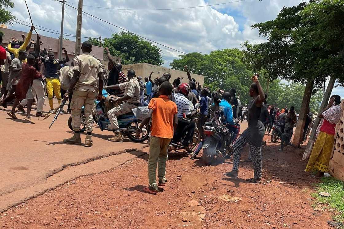 An angry crowd gathered at Kati after the attack, accusing a man (not pictured) of being one of the assailants