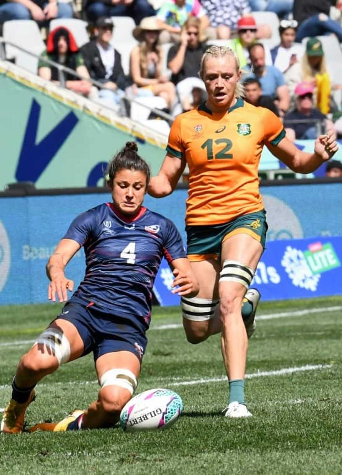 Nicole Heavirland of the United States  (L) and Maddison Levi of Australia (R) in action during the women's Rugby World Cup Sevens semi-final in Cape Town Nicole Heavirland of the United States  (L) and Maddison Levi of Australia (R) in action during the women's Rugby World Cup Sevens semi-final in Cape Town