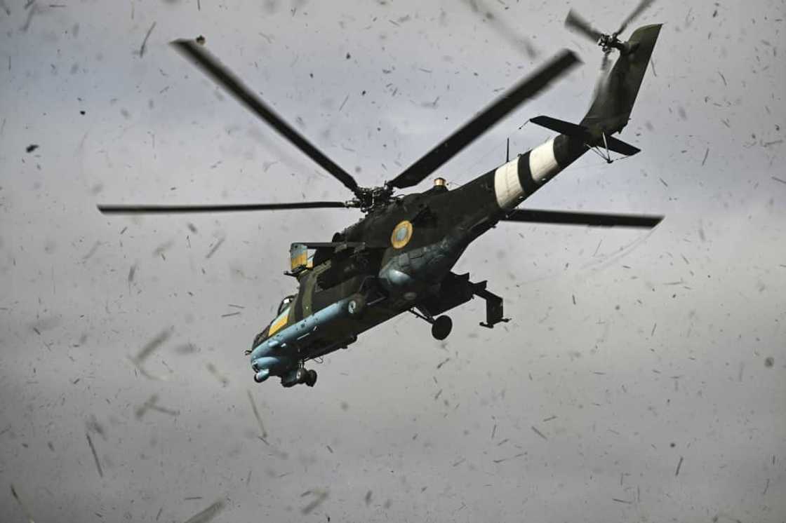 The Mi-24 attack helicopter is smaller than a Mi-8, more manoeuvrable and heavily armoured The Mi-24 attack helicopter is smaller than a Mi-8, more manoeuvrable and heavily armoured