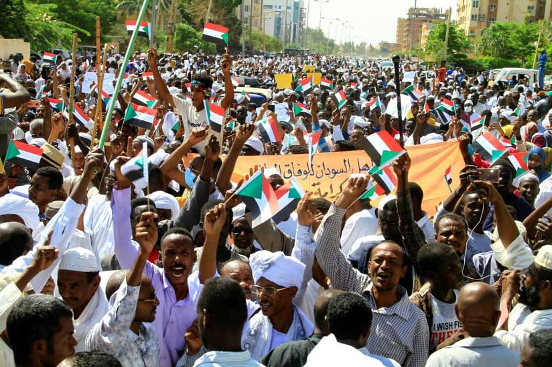 The crowd that gathered Saturday in front of the headquarters of the UN mission in Sudan chanted pro-Bashir slogans and burned photos of UN envoy Volker Perthes The crowd that gathered Saturday in front of the headquarters of the UN mission in Sudan chanted pro-Bashir slogans and burned photos of UN envoy Volker Perthes
