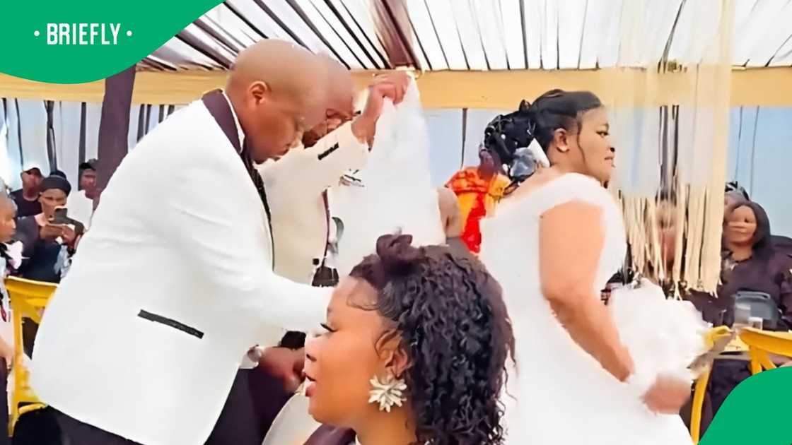 Woman reportedly marries two men in video Woman reportedly marries two men in video