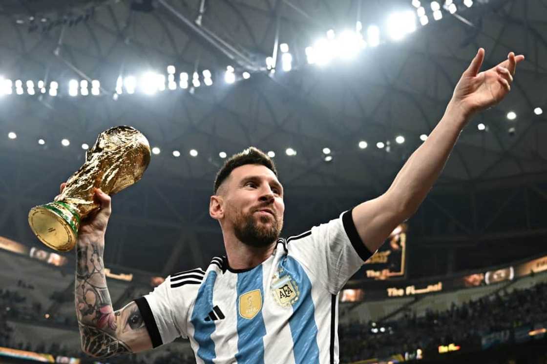 Adidas icon: Lionel Messi celebrates after leading Argentina to victory over Nike's France  in the 2022 World Cup final Adidas icon: Lionel Messi celebrates after leading Argentina to victory over Nike's France  in the 2022 World Cup final