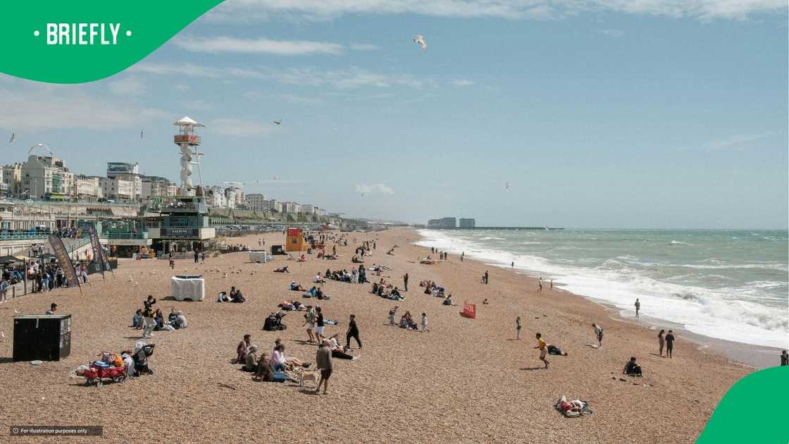 UK resident bath in ocean after water cuts UK resident bath in ocean after water cuts