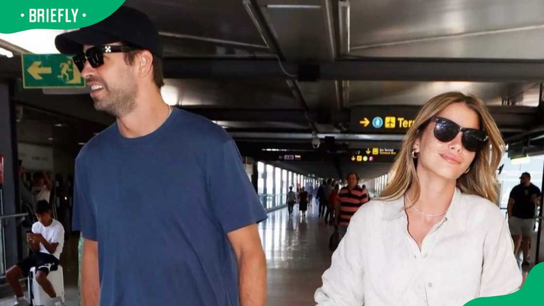 Gerard Pique and Clara Chia at Adolfo Suarez Madrid Barajas airport Gerard Pique and Clara Chia at Adolfo Suarez Madrid Barajas airport