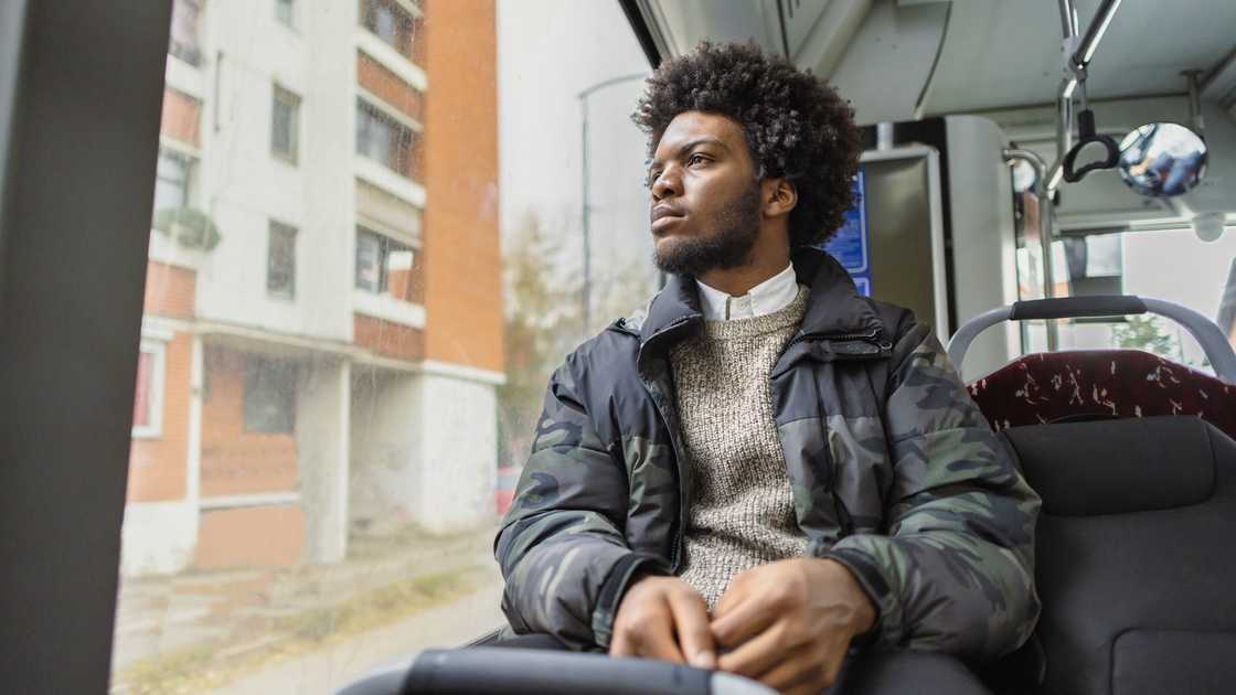 A student in a bus A student in a bus