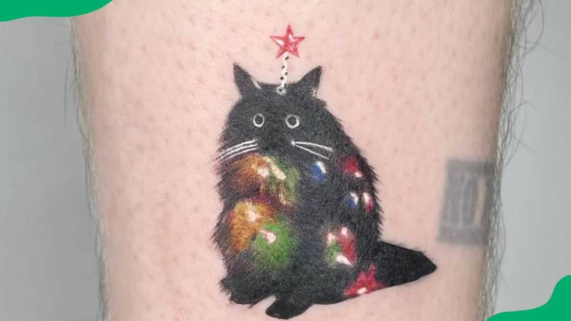 Christmas cat tattoo Christmas cat tattoo