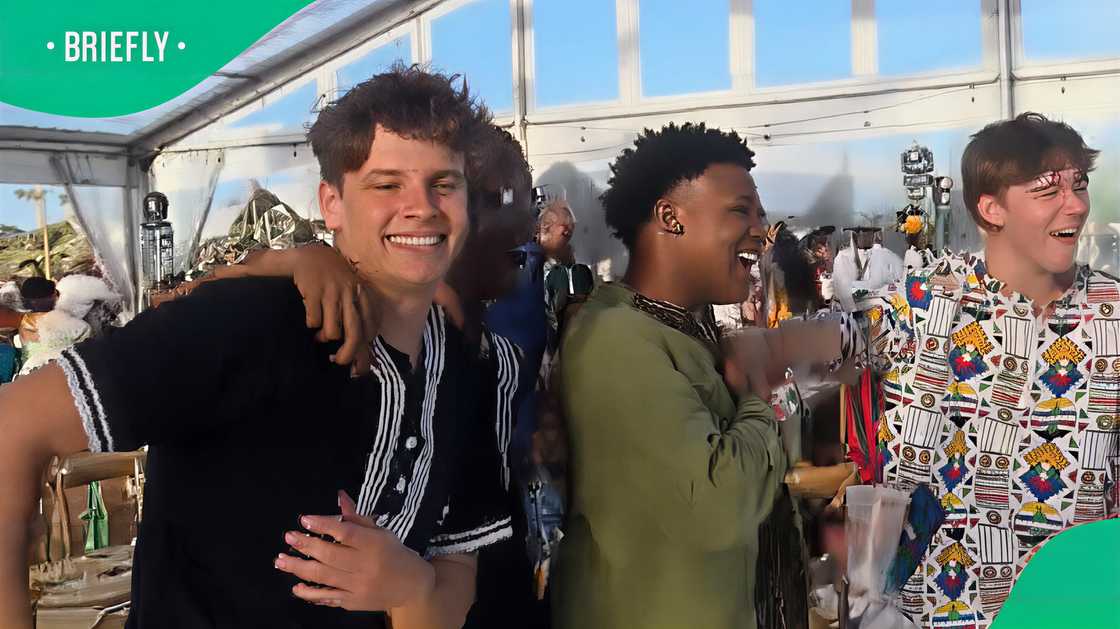 A group of men from different backgrounds and racial groups celebrated a wedding in honor. A group of men from different backgrounds and racial groups celebrated a wedding in honor.