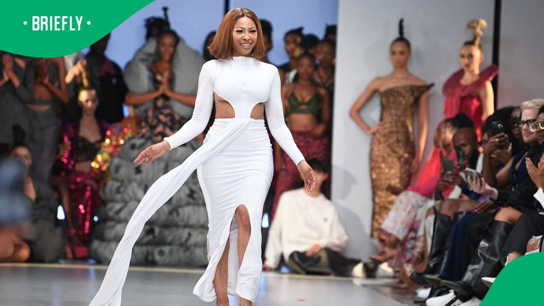 Enhle Mbali walks on the runway