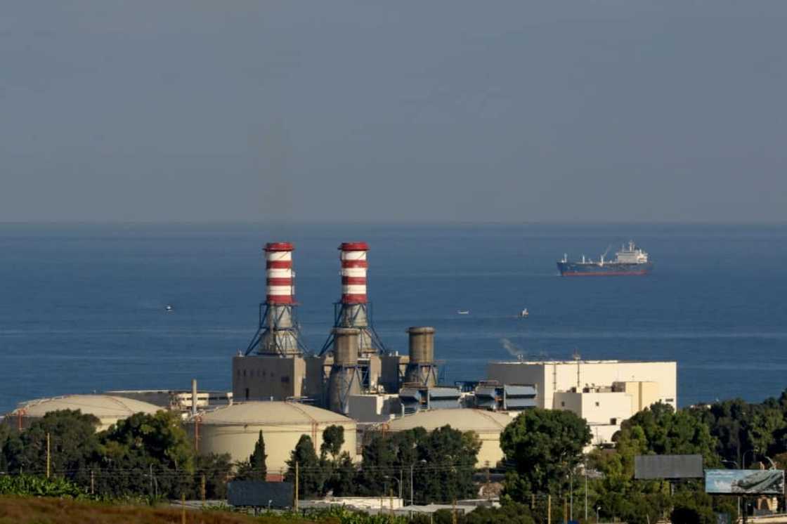 A tanker carrying fuel oil from Iraq is anchored off the Zahrani power plant near the southern Lebanese city of Sidon (Saida) on September 18, 2021