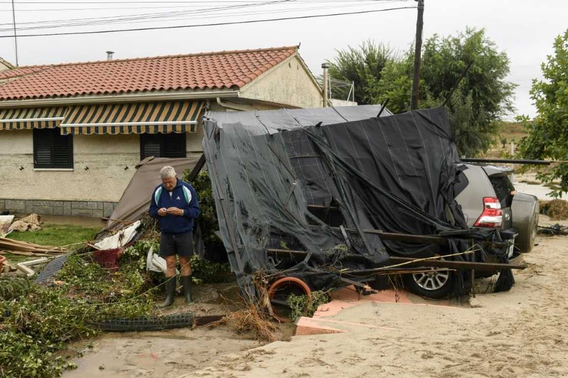 Rubble in front of a house in the flood-hit town of Aldea del Fresno Rubble in front of a house in the flood-hit town of Aldea del Fresno