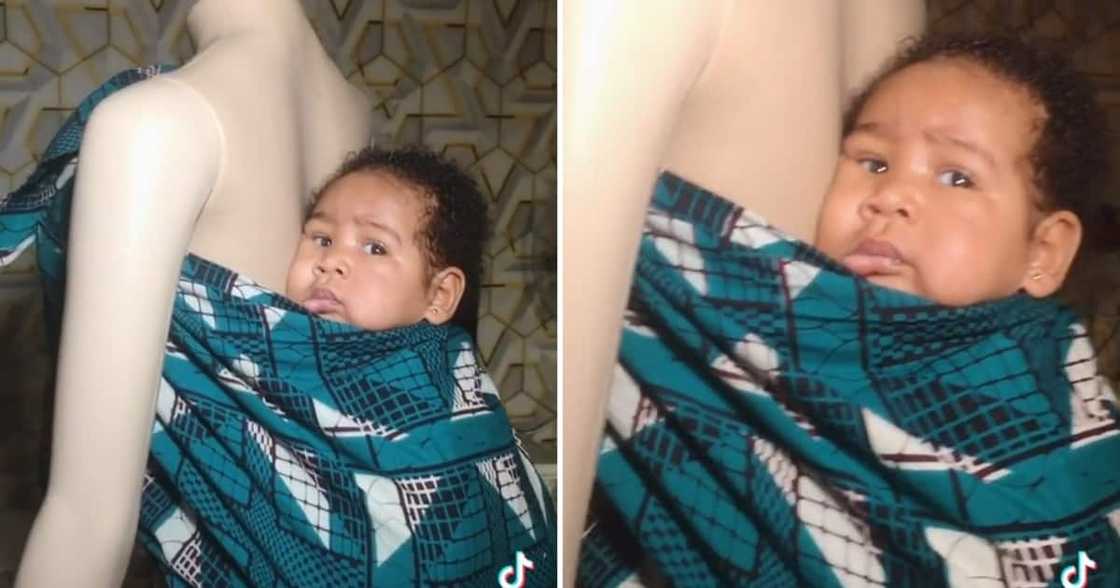 Baby wrapped around mannequin Baby wrapped around mannequin