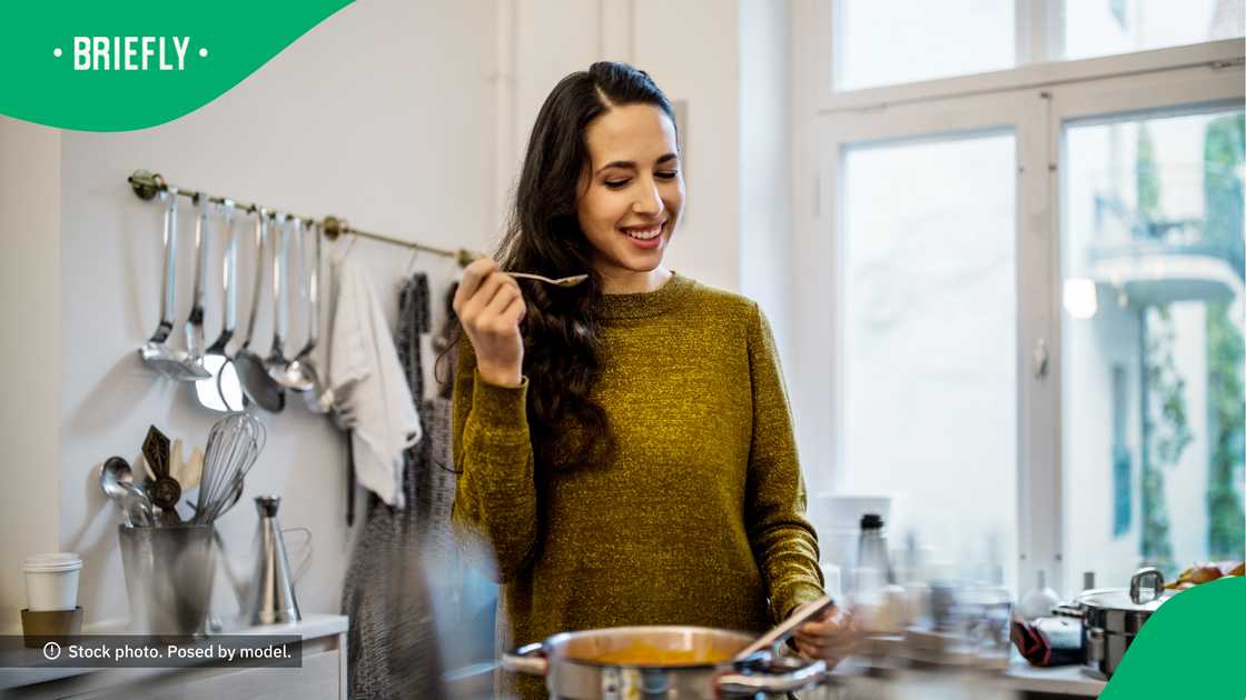 The woman creates unconventional meals. The woman creates unconventional meals.