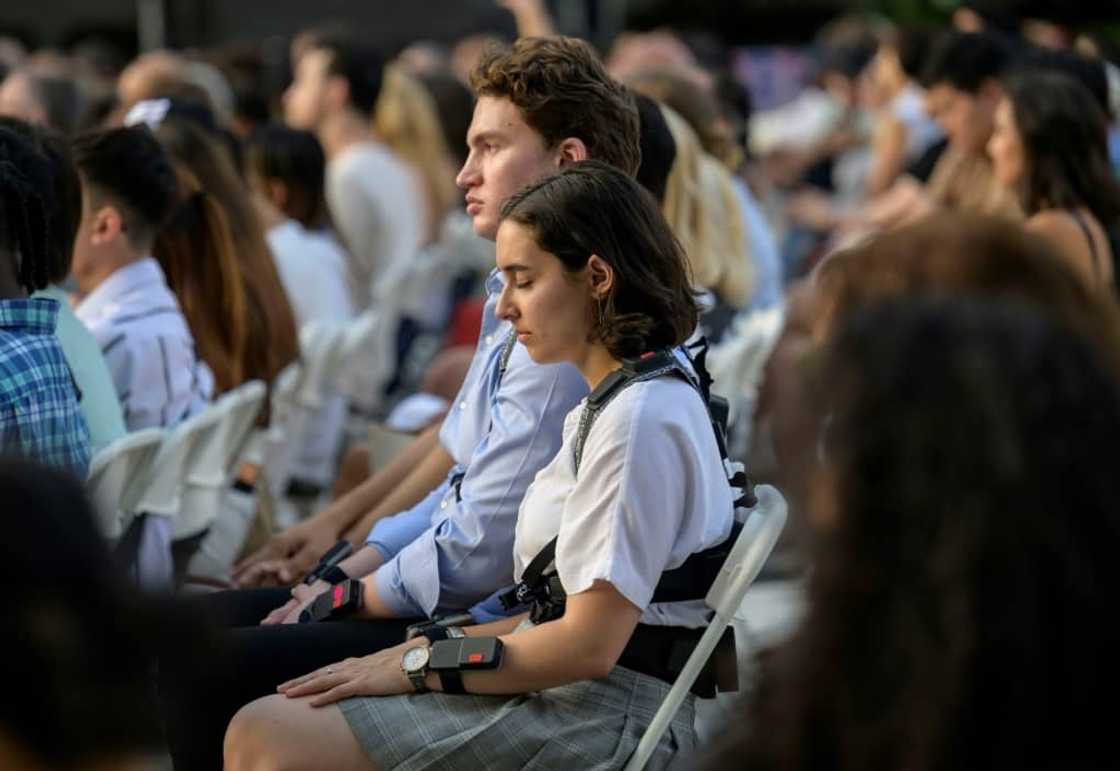 Concertgoers in New York wear haptic suits, which translate music into vibrations on the body, created for the deaf community