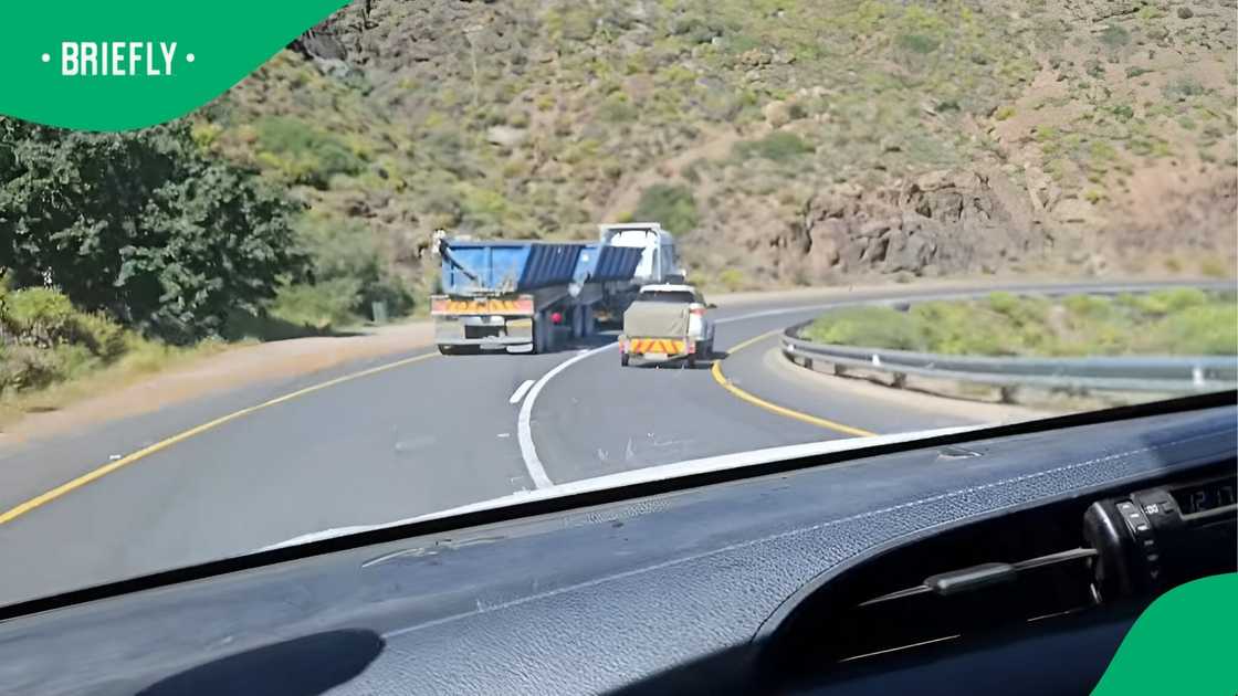 A car overtook trucks on Vanryhns Pass. A car overtook trucks on Vanryhns Pass.