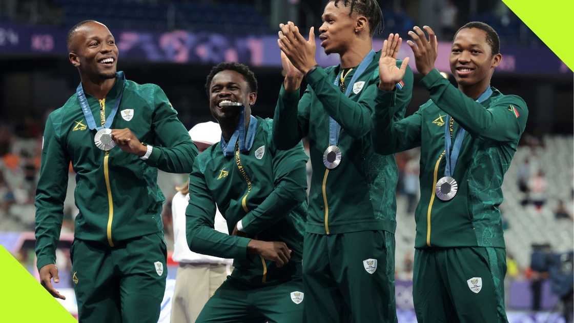 Team South Africa celebrate silver medal win in Men's 4x100m relay. Team South Africa celebrate silver medal win in Men's 4x100m relay.