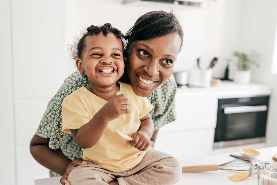 A nanny and a toddler