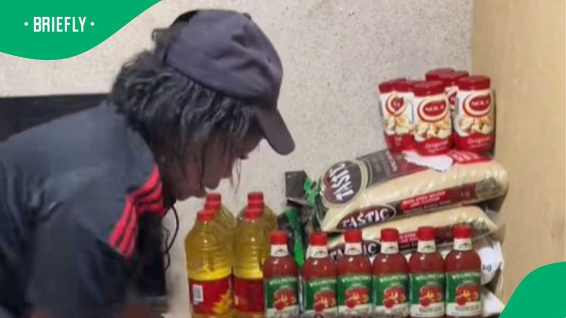 Woman shows stokvel groceries for hundreds of rands per month