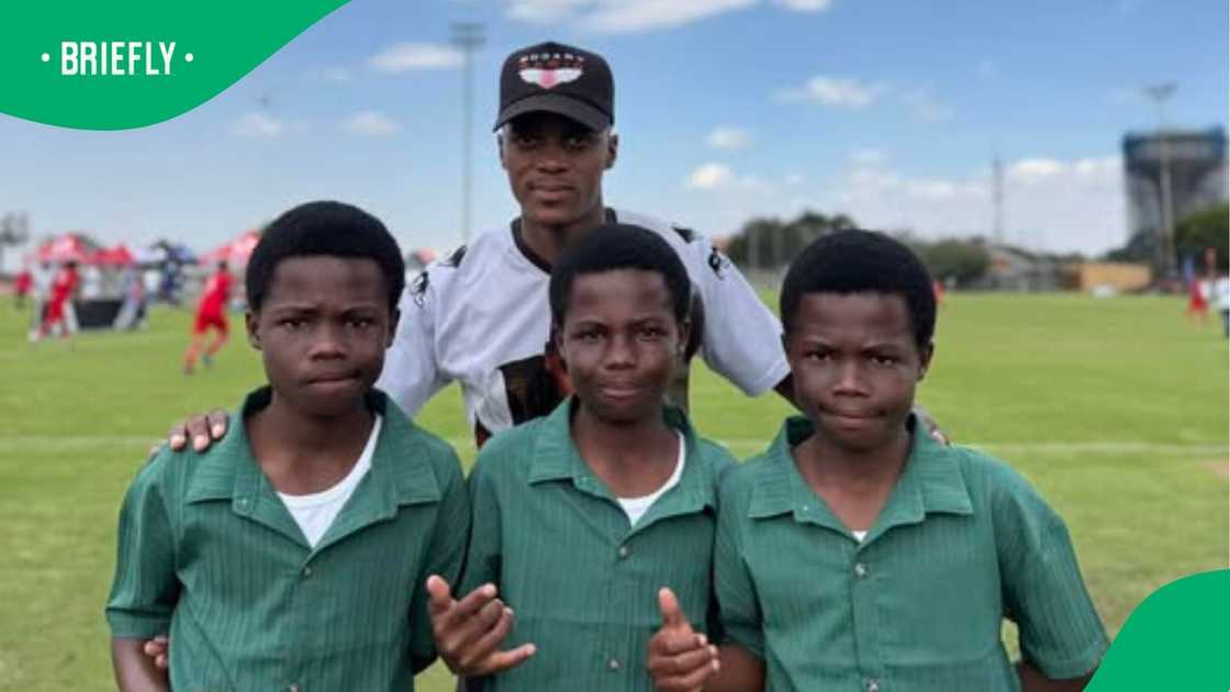 Picture of Zwide triplets and Reggie Ndlovu at Pirates Cup Picture of Zwide triplets and Reggie Ndlovu at Pirates Cup