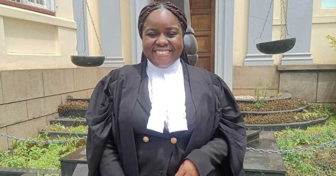 A young lady smiles broadly after becoming a legal practitioner A young lady smiles broadly after becoming a legal practitioner