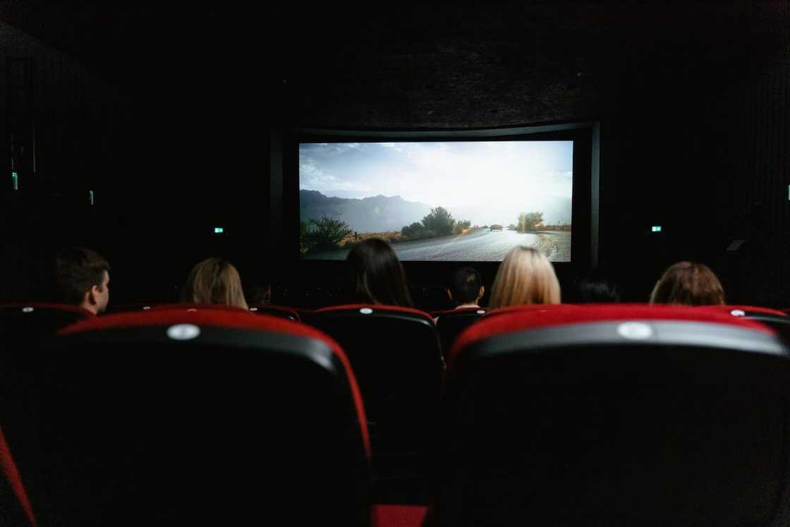 A group of people watching movie A group of people watching movie