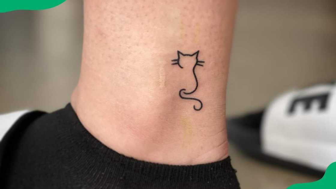 Cat outline tattoo Cat outline tattoo