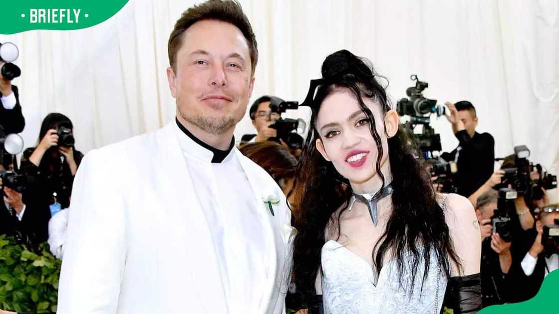 Grimes and Elon Musk at an event Grimes and Elon Musk at an event