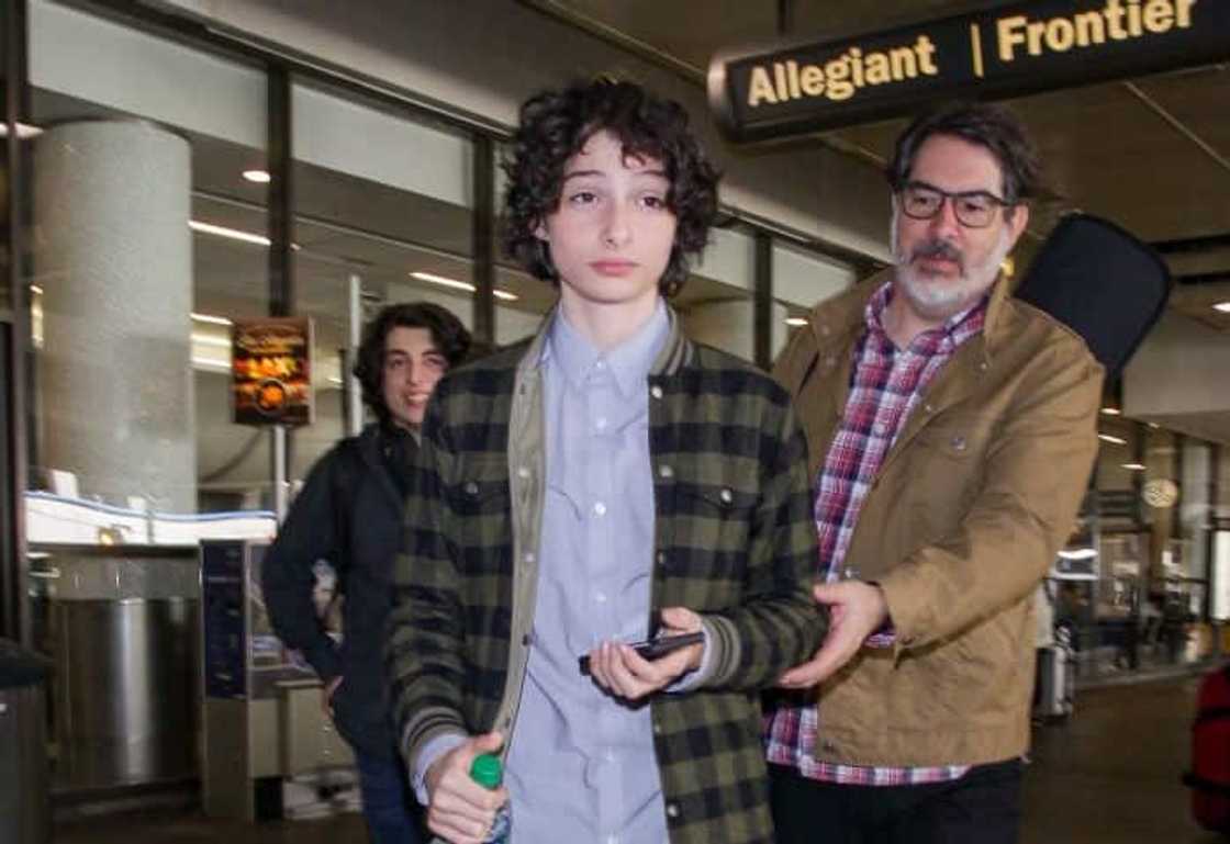 What does Finn Wolfhards dad do for living?