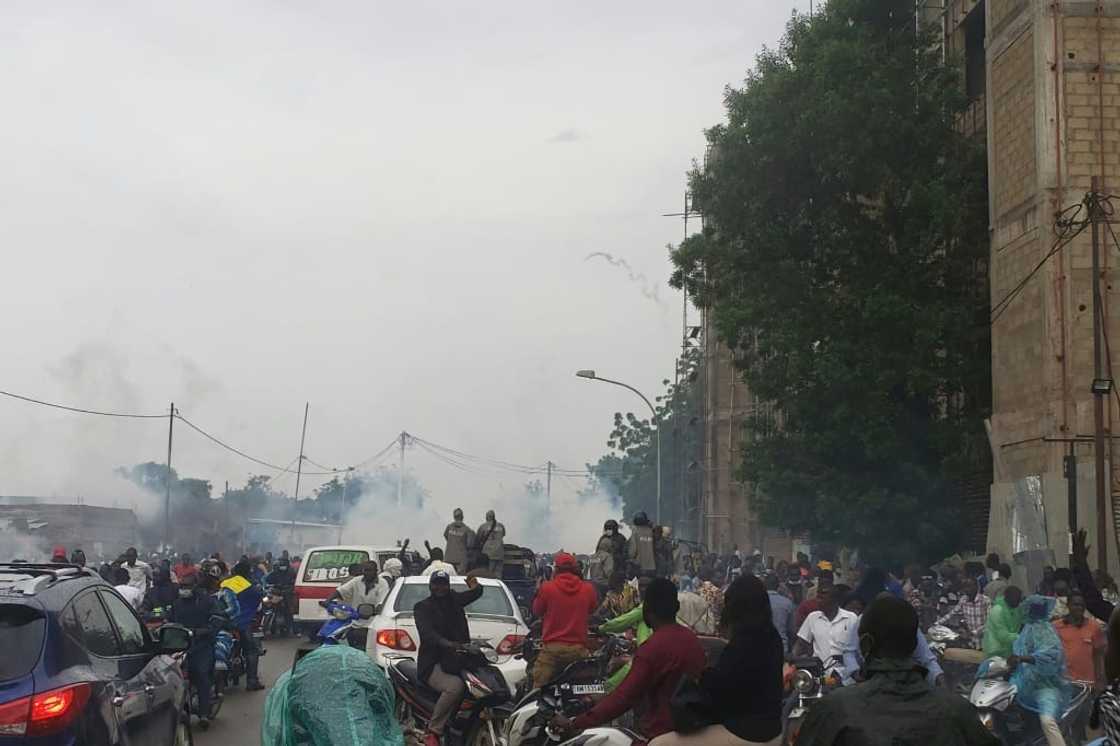 Police fired tear gas to disperse a large crowd surrounding opposition leader Succes Masra's car Police fired tear gas to disperse a large crowd surrounding opposition leader Succes Masra's car