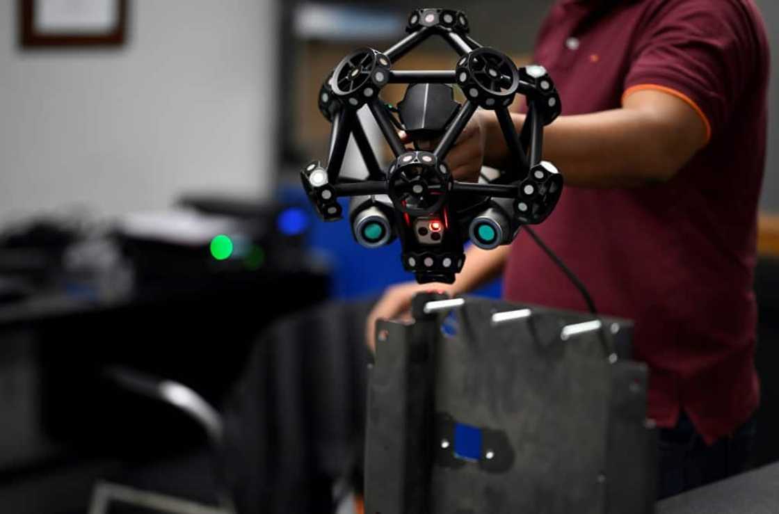 A worker carries out a 3D scan at an Aztek Technologies plant in northern Mexico A worker carries out a 3D scan at an Aztek Technologies plant in northern Mexico