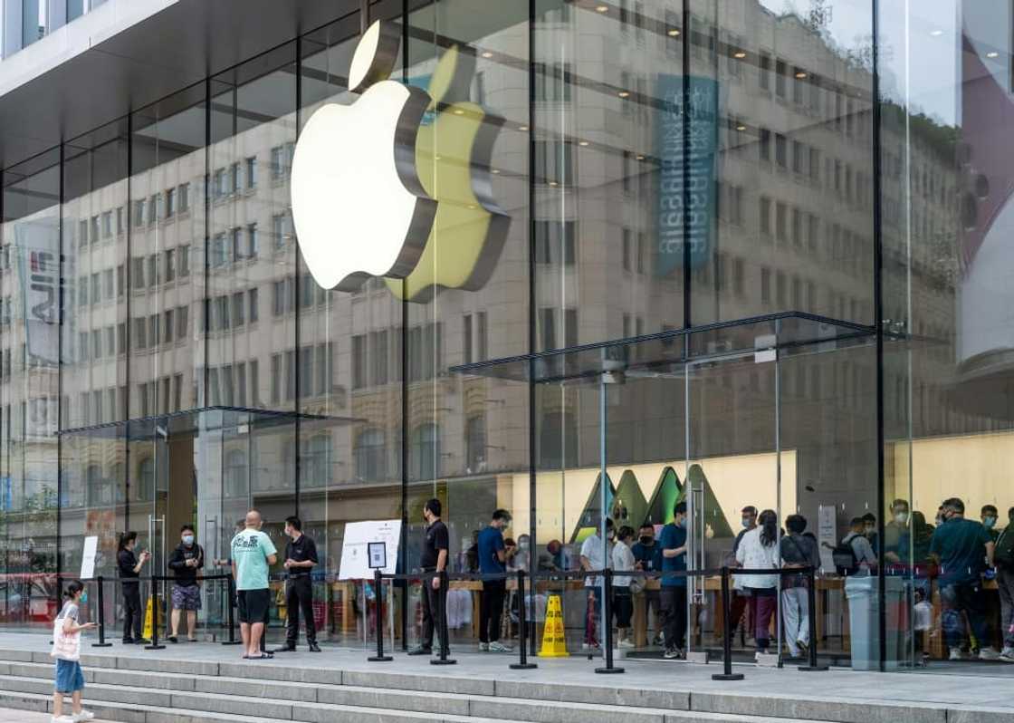 People enter an Apple store in Shanghai in June 2022 amid rising US calls to reduce reliance on China's giant economy