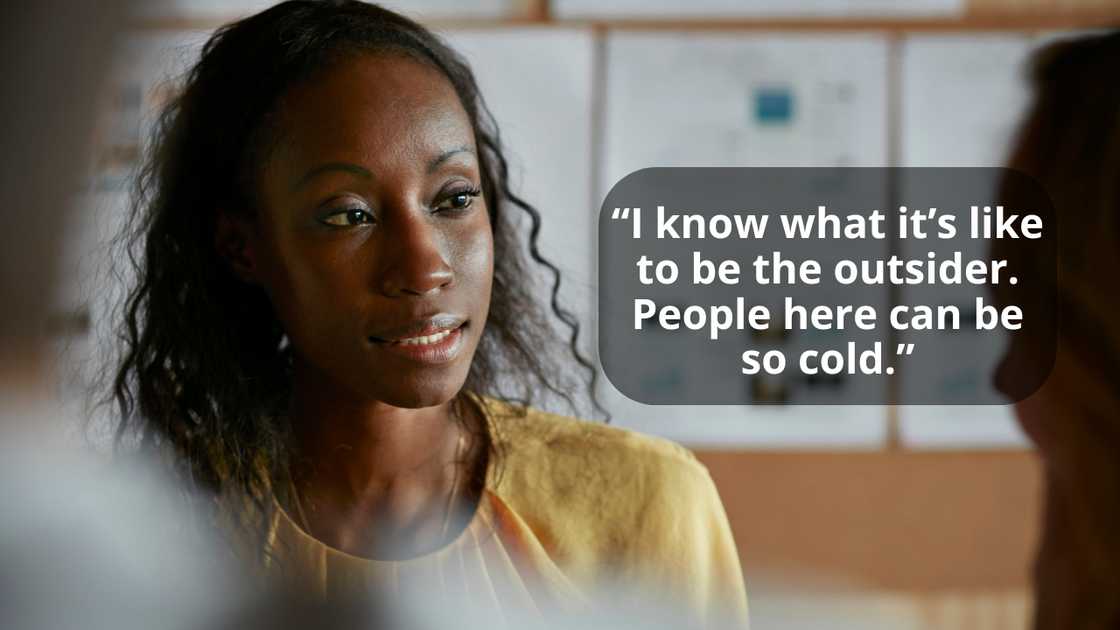 A female coworker talking with her friend in the office