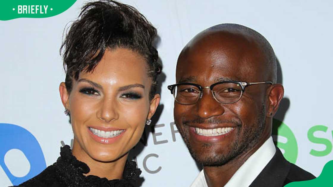 Actor Taye Diggs (R) and Model Amanza Smith Brown (L) at the Warner Music Group annual GRAMMY celebration Actor Taye Diggs (R) and Model Amanza Smith Brown (L) at the Warner Music Group annual GRAMMY celebration
