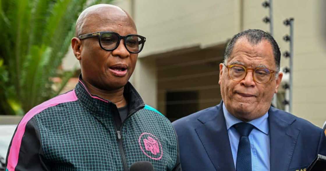 Zizi Kodwa and Danny Jordaan